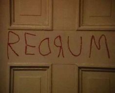 the word'return'written in red ink on a door