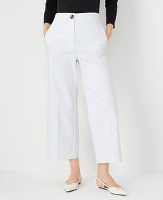 Elevate your wardrobe with the chic sophistication of Ann Taylor's The Kate Wide Leg Crop Pant. Perfectly tailored to flatter your figure, these pants boast a high-rise fit that sits just below the natural waist and a wide leg silhouette that adds a modern twist to your ensemble. The crisp white color enhances its versatility, making it a must-have for any fashion-forward wardrobe.

- Size: 4
- Color: White
- Gender: Female
- Material: 52% Cotton, 45% Polyester, 3% Elastane
- Fit: Tailored and f Spring Wide Leg Ankle-length Pants With Welt Pockets, Spring Ankle-length Wide Leg Pants With Welt Pockets, Spring Workwear Wide Leg Pants With Straight Hem, Spring Wide Leg Pants For Workwear With Straight Hem, Spring Workwear Wide Leg Pants, Cropped Wide Leg Pants With Welt Pockets For Work, Chic Cropped Wide Leg Work Pants, Tailored Wide Leg Ankle-length Pants For Spring, Tailored Ankle-length Wide Leg Pants For Spring