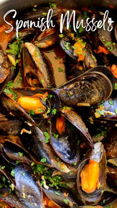 spanish mussels in a pot with parsley