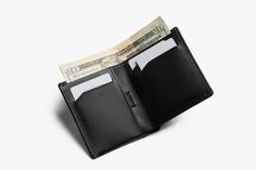 A traditional design with surprising storage, the Note Sleeve holds cards, bills and coins in a trim, professional billfold made with premium, environmentally certified leather. Features: space to hold up to 11 cards a full-sized note section to store bills flat a coin pocket 3 quick access slots and a pull tab for less used cards RFID protection Backed by a 3 year warranty from Bellroy, a certified B corp founded and based in Australia. BellroyDesigned in Australia Made with premium hides tanne Bellroy Wallet, Rfid Blocking Wallet, Rfid Wallet, Card Storage, Slim Wallet, Best Bags, Water Resistant Fabric, Coin Pouch, Black Charcoal