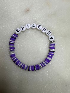 Beaded bracelet set for Epilepsy Awareness   - purple/silver Adjustable Purple Beaded Bracelet With Silver Beads, Trendy Personalized Purple Stretch Bracelet, Adjustable Purple Letter Beads Bracelet, Adjustable Purple Beaded Bracelets With Letter Beads, Adjustable Lavender Beaded Bracelets With Letter Beads, Personalized Purple Stretch Bracelet With Round Beads, Personalized Purple Round Beads Stretch Bracelet, Personalized Adjustable Purple Stretch Bracelet, Personalized Purple Adjustable Stretch Bracelet