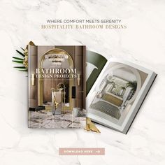 the bathroom design book is open to show it's interior and its decor items