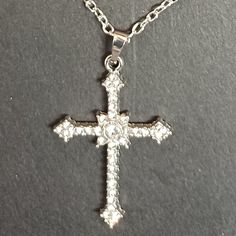 This Listing Is Eligible For Our 5 For $20 Deal! Just Put At Least 5 "5 For $20" Items In Your Bundle And We'll Send You An Offer Search “5 For 20” To Find Them Leaving Posh Soon! (Get The Items You Want Before Someone Else Does) Absolutely Beautiful! One Of The Most Beautiful Ornate Crosses You Will Find For The Money Dangles Right Over Your Heart It's A Nice Size Cross - Very Feminine Cross Is A Little Over 1" Tall (1-1/2" Including Bale) By 1" Wide Necklace Is 20"-22" Long Lobster Clasp * Adj Rhinestone Cross Necklace With Adjustable Chain As Gift, Metal Rhinestone Necklace Gift, Sparkling Metal Rhinestone Necklace Gift, Silver Cross Pendant Jewelry For Party, Silver Cross Pendant Necklace For Party, Crystal Cross Pendant Necklace With Bling, Adjustable Cross-shaped Party Jewelry, Silver Cross Jewelry For Party, Adjustable Sparkling Necklace As A Gift