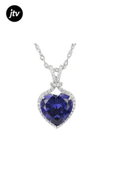 Bella Luce�� Esotica��� tanzanite and white diamond simulants 11.58ctw heart and round, rhodium over sterling silver heart pendant. Pendant measures approximately 0.94" L x 0.56" W and has a 2mm bail. Includes 18" L 0.03" W singapore chain that has a 2" extender and lobster claw clasp closure. Sterling Silver Heart Pendant, Silver Heart Pendant, Pendant With Chain, Diamond Simulant, Sterling Silver Heart, Silver Heart, White Diamond, Heart Pendant, Cubic Zirconia