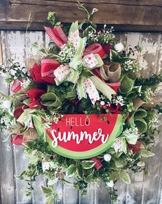 a watermelon wreath with the words hello summer on it