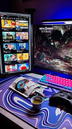 a computer desk with a gaming keyboard and mouse next to a monitor on which there is a video game