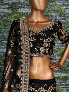 A perfect definition of superb craftsmanship in this beautiful black-colored designer Sabyasachi bridal lehenga choli. Comes with an attached can-can inside.
Beautified with amazing heavy embroidery with zari,dori & sequence work within the attire adds a sign of elegance statement with your look.
The semi-stitched lehenga is made of Thai Silk fabric accompanied with unstitched embroidered matching fabric blouse pieces and embroidered Thai Silk dupatta.
Suitable to wear for wedding functions, Black Dola Silk Sets With Zari Work, Embroidered Kundan Choli For Party, Black Art Silk Blouse Piece For Wedding, Black Dola Silk Set With Traditional Drape, Festive Black Dola Silk Lehenga, Black Art Silk Blouse Piece With Resham Embroidery, Black Embroidered Art Silk Saree Fabric, Black Art Silk Embroidered Fabric In Traditional Drape, Black Art Silk Embroidered Saree Fabric