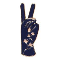 a lapel pin with the shape of a peace sign and flowers on it's side