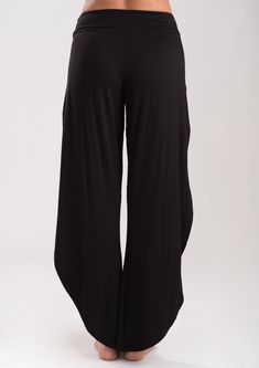 Made from our finest heavy weight jersey, these boho pants offer versatility, function and style. You can wear open or tied up for a jogger look. Fabric & Fit Moisture wicking, ultra soft active jersey. 95% Rayon 5% Spandex. Gentle or hand wash in cold water. Lay flat or line dry. 29" inseam measuring from a small. XS 0-2, S 2-4, M 6-8, L 10-12, XL 14-16. Versatile Harem Pants For Loungewear, Versatile Loose Fit Harem Pants For Loungewear, Stretch Wide-leg Harem Pants For Loungewear, Versatile Harem Trousers For Loungewear, Comfortable Black Wide-leg Harem Pants, Black Wide-leg Yoga Pants For Loungewear, Black Wide-leg Yoga Bottoms, Black Wide-leg Pants For Yoga, Versatile Yoga Trousers For Loungewear