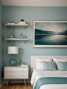 a bedroom with blue walls, white bedding and two shelves on either side of the bed