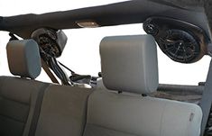 the interior of a vehicle with steering wheel and dashboard controls