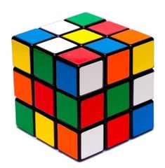 a colorful rubik cube sitting on top of a white table