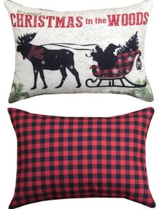 two christmas pillows with moose and sleighs on the front, one is red and