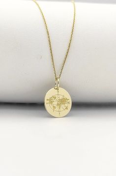 Welcome to ElegantGoldJewels,  Find all the information you need about your charm: Material of pendant: 14K Solid Gold Stamp: 585 (14K) Thickness: 0.5mm Jumpring Diameter: 4mm The pendant is available in 6 sizes: - 13mm / 0.52 inches - 15mm / 0.59 inches - 18mm / 0.70 inches - 20mm / 0.78 inches - 22mm / 0.86 inches - 24mm / 0.94 inches - 26mm / 1.02 inches - 28mm / 1.10 inches - 30mm / 1.18 inches Chains Information: Rolo Chain: -14K Real Gold - 0.70mm thick - Spring Ring Clasp - 16 inches / 40 Charm Necklace With Round Pendant, Personalized Gold Jewelry For Travel, Gold Engraved Jewelry For Travel, Personalized Gold Necklace For Travel, Engraved Medallion Necklace For Travel, Travel Engraved Gold Jewelry, Personalized Pendant Necklaces For Travel, Earth Necklace, Compass Jewelry