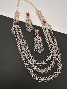 AD Ruby Red Stone Multi Layer Long Necklace Party wear long multi layer necklace  Perfect for house warmings, Half Saree Function, Wedding or any Indian Function Necklace Length : Approx. 24 Inches;  Earrings Length : 2.75 Inches; Push Back Ready to ship from Massachusetts, USA If you have any questions please let me know. Thank You!! Elegant Red Long Necklace, Pink Ruby Necklace For Party, Red Long Necklace For Wedding, Red Long Necklace For Formal Occasions, Multi-strand Red Jewelry For Party, Red Multi-strand Party Jewelry, Festive Red Multi-strand Jewelry, Half Saree Function, Necklace Ruby