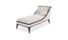 a white chaise lounger with pillows on it's back and side panels