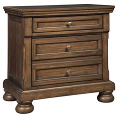 a wooden dresser with three drawers and two pulls on the bottom drawer, in dark brown wood