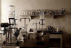 an old fashioned laboratory filled with lots of glassware