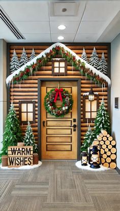 the front door is decorated for christmas with wreaths and pine trees