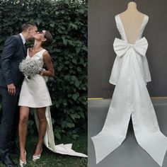 a man and woman kissing in front of a dress made out of white cloths