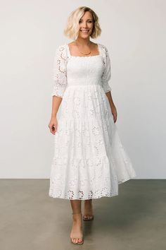 The Fabian Maxi Dress is a romantic dream! It features cute puff sleeves, and a white color! White Smocked Midi Dress, Broderie Anglaise Midi Dress For Brunch, White Smock Midi Dress, Brunch Midi Dress With Broderie Anglaise, Brunch Broderie Anglaise Midi Dress, White Midi Dress With Smocked Cuffs, Casual Style, White A-line Midi Dress With Smocked Bodice, Summer V-neck Midi Dress With Smocked Cuffs, Fitted Eyelet Dress, Midi Length