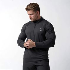 performance 1/4 zip obsidian front Functional Compression Tops For Outdoor Activities, Breathable Techwear Activewear For Gym, Outdoor Sweat-resistant Stretch Tops, Techwear Moisture-wicking Activewear For Gym, Black Moisture-wicking Techwear Tops, Techwear Activewear For Gym With Moisture-wicking, Outdoor Stretch Sweat-resistant Tops, Stretch Sweat-resistant Tops For Outdoor Activities, Black Half-zip Training Top