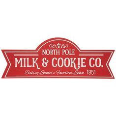 a red sign that says north pole milk and cookie co