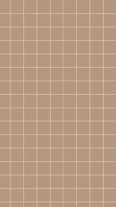 a brown tiled wall with white lines on the top and bottom tiles in different sizes