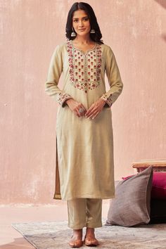 A beautiful kurta pant set perfect for the winters to brighten up any grey gloomy day☀️ Part of a limited edition faux wool collection in a beautiful beige colour , features an exclusive hand embroidered detail on neck and sleeves. Perfect for a festive occasion or a cold day out 🌸  Available in size M only!  Fabric & Lining: faux wool with modal lining Kurta : Outer: Handloom Acrylic wool, Inner: Muslin (55% Modal, 45% Viscose) Pants : handloom acrylic  Craft: Resham dori embroidery on the yok Festive Fall Kurta With Chikankari Embroidery, Festive Kurta With Chikankari Embroidery For Fall, Chikankari Embroidery Kurta For Festive Occasions In Fall, Fall Festive Kurta With Floral Embroidery, Fall Floral Embroidered Straight Kurta, Festive Fall Kurta With Floral Embroidery, Unstitched Resham Embroidery Kurta For Fall, Festive Floral Embroidered Kurta For Fall, Festive Beige Straight Kurta Set