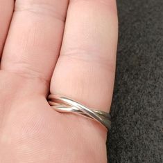 This ring is made by us using nickle-free sterling silver wire.  Due to the way the ring is made the sizes could be off by 1/4 to 1/2 a size, but we will do our best to get you the right size you need. Minimalist Sterling Silver Wire Wrapped Rings, Minimalist Silver Wire-wrapped Rings, Minimalist Silver Wire Wrapped Rings, Simple Silver Hypoallergenic Rings, Simple Hypoallergenic Silver Rings, Silver Wire Wrapped Rings For Anniversary, Silver Anniversary Ring With Wire Wrapped Detail, Anniversary Silver Wire Wrapped Rings, Wire Wrapped Sterling Silver Rings