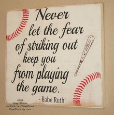 a sign that says never let the fear of striking out keep you from playing the game