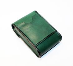 Business card holder. The leather is cut, punched, stitched and dyed, all by hand. Material: leather Color: Green. Size: 10cm x 6.5cm It could hold 20 credit cards comfortably. And it also can be used as a business card holder . If you have any questions please write. Leather Business Card, Leather Business Card Holder, Leather Credit Card Wallet, Business Card Cases, Leather Bookmark, Handmade Wallets, Green Cards, Gifts For Bookworms, Credit Card Wallet