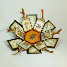 a clock made out of old book pages