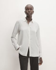 A more relaxed take on the classic button-down—with a silky smooth feel. Polished and easy, the Clean Silk Relaxed Shirt has a traditional point collar and a round hem that looks just as good worn loose as it does tucked in. Plus, it’s made of our eco-conscious Clean Silk, for more beauty and less waste. Bone White, Black Polka Dot, Black Shirt, Must Haves, Work Wear, Shirt Blouses, Polka Dot, Top Shirt, White And Black