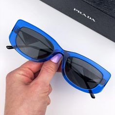 Prada Pr14ys 18m5s0 Sunglasses Crystal Electric Blue Grey Rectangle Women Brand: Prada Model: Pr14ys Color Code: 18m5s0 Gender: Women Year: 2022 Frame Colour: Crystal Electric Blue Frame Shape: Rectangle Frame Style: Full Rim Frame Material: Plastic Lens Color: Dark Grey Lens Material: Plastic Uv Protection: Category 3 Size: 53x19x140 100% Uv Protection Made In Italy. Full Retail Package With All Accessories: Case, Cloth And All Paperwork. 100% Authentic! Modern Blue Rectangular Sunglasses, Chic Blue Square Frame Sunglasses, Chic Blue Rectangular Sunglasses, Prada Sunnies, Brown Mirror, Purple Sunglasses, Prada Model, Red Sunglasses, White Sunglasses