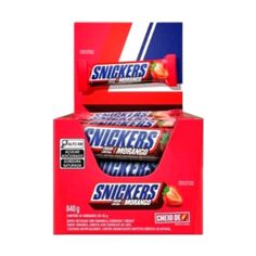 two boxes of snickkers are stacked on top of each other