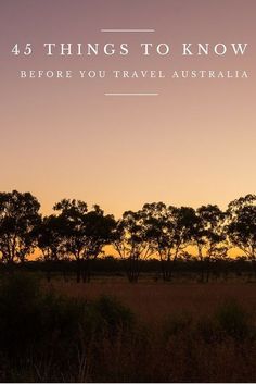 the sun is setting behind some trees with text that reads, 45 things to know before you travel australia