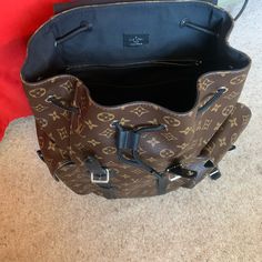 Louis Vuitton Brand New 100% Authentic Come With Dust Bag And Box. The Box Have Tear Down On One Size Because In Accident Open To Make A Tear. This Backpack Have No Sign Of Wear Travel Bag In Monogram Canvas With Original Box, Luxury Coated Canvas Backpack, Luxury Coated Canvas Leather Backpack For Daily Use, Luxury Coated Canvas Backpack For Daily Use, Brown Monogram Canvas Bag With Palladium Hardware, Luxury Travel Bag In Signature Coated Canvas, Luxury Monogram Canvas Backpack, Luxury Signature Coated Canvas Travel Bag, High-end Leather Backpack