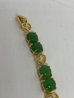 Vintage Green Jade Bracelet Golden white bronze vintage white bronze Does not tarnish Genuine green jade color enhanced 7.5 inches All jewelry is shipped in a nice gift box. Check out our over a THOUSAND great reviews Engraving is $4 per letter and is not always perfect depending on the piece. It can take a few days if the jeweler is busy. This is payable to Paypal Judithsltd@gmail.com Classic Green Bracelets For Gifts, Green Jade Bracelet, Verde Jade, Jade Color, Blue Topaz Bracelet, Purple Jade, Lock Style, Jade Bracelet, Topaz Stone