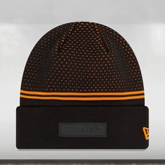 The 2024 McLaren F1™ Team Engineered Knit McAuto Beanie is an exceptional accessory that combines style, comfort, and functionality in a seamless manner. Created using advanced engineered knit technology, this beanie offers a snug and comfortable fit while providing superior insulation against the cold. The design of the McAuto Beanie showcases McLaren's dedication to innovation and performance, with a sleek and modern aesthetic and the iconic McLaren logo prominently featured. Crafted from prem Black Breathable Beanie Hat, Black Sports Beanie For Winter, Modern Black Streetwear Hat, Modern Black Winter Hat, Black Beanie For Sports, Black Sporty Beanie Hat, Functional Black Hats For Winter, Sporty Black Beanie Hat, Functional Black Hat With Sweatband