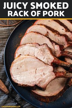 slices of juicy smoked rack of pork on a black plate with text overlay that reads juicy smoked rack of pork