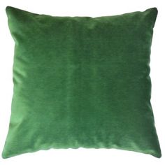 a green pillow on a white background