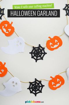 halloween garland with cut out pumpkins and ghost faces