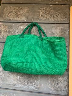 "Etra Large Kiondo shopping bag,Oval base sisal bag, storage bag, Home organizing bag,Sisal kiondo basket, Green kiondo bag. The Natural color with black stripes bag is great for your day out shopping or at the beach. Can also be used for your home organization and storage. Dimensions Top 30\" Height 13.5\" Base lenght 20\"x 13.5\" wide Ready to ship Thank you so much for shopping with us!" Green Beach Bag With Braided Handles For Shopping, Green Jute Crochet Bag For Daily Use, Green Handwoven Crochet Bag For Shopping, Green Handwoven Crochet Shopping Bag, Green Straw Tote Bag For Shopping, Green Jute Straw Bag For Daily Use, Green Jute Straw Bag For Everyday Use, Green Tote Straw Bag For Shopping, Large Straw Beach Bag