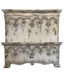 an old white planter with ornate designs on the top and bottom, sitting against a white background