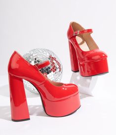 Walk with confidence in these show-stopping platform Mary Janes from Unique Vintage. This pair of statement heels are crafted in a red patent leatherette. Complete with a 2 inch platform, 6 inch heel, and an adjustable buckle. Available while supplies last Statement Heels, Red Platform, 6 Inch Heels, Platform Mary Janes, Come Undone, Mary Jane Heels, Heels & Wedges, Vintage Branding, Red Shoes