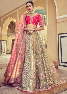 Woven zari Banarasi silk lehenga choli in Beige and Pink 6001 Desc:  Style : A-Line Lehenga Choli Color : Beige and Pink Fabric : Silk   Work : Heavy Jacquard Woven With Embroidery & Stone Work Wash Care : Dry clean Sleeve Style : Half Sleeve Long Sleeves : Done only in Custom Stitch Sleeves Lining : Done only in Custom Stitch Bust Size : 32 to 42 Inches Occasion : Wedding   Mehendi   Sangeet   Engagement   Reception   Ceremonial   Baby ShowerShop Banarasi lehenga,silk lehengas,hea Red Bride, Tulle Shawl, Bridesmaid Lehenga, Silk Lehenga Choli, Raw Silk Lehenga, Lehenga Red, Modest Evening Dress, Pretty Skirts, Embroidered Lehenga