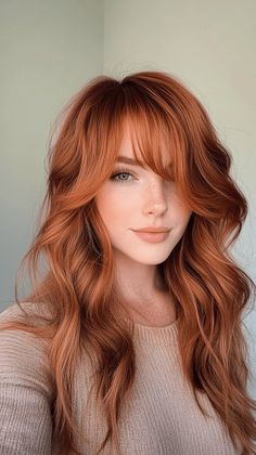 Embrace the warmth of November 2024 with these stunning copper waves paired with soft curtain bangs. The rich copper tones bring out autumnal vibes, while the loose waves create a relaxed yet polished look. Ideal for those who love a blend of color and texture, this hairstyle will have you glowing all season long. Ginger Hair Color With Bangs, Ginger With Curtain Bangs, Copper Balayage Curtain Bangs, Redhead With Lowlights, Copper Hair Cool Skin Tone, Winter Copper Hair, Hair Ideas Ginger, Copper Hair With Curtain Bangs, Winter Ginger Hair