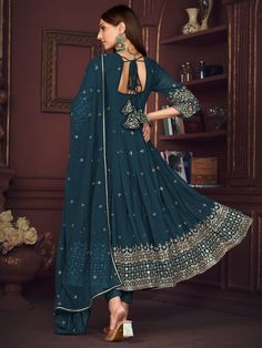 Elevate your ethnic wardrobe with this stunning tantalizing blue embroidered georgette anarkali suit with dupatta. Crafted from high-quality georgette material, this suit features intricate sequin and embroidered work that adds a touch of elegance and glamour to your look. The beautiful blue color of the suit is perfect for festivals, functions, or any special occasion.
This anarkali suit include its semi-stitched design, allowing for a comfortable fit for sizes up to 42 inches. The set also com Blue Anarkali Set With Intricate Embroidery, Blue Floor-length Salwar Kameez In Georgette, Blue Churidar With Intricate Embroidery In Georgette, Semi-stitched Blue Chinon Anarkali Set, Blue Georgette Anarkali Set With Resham Embroidery, Blue Anarkali Set With Mirror Work In Georgette, Blue Floor-length Chinon Anarkali Set, Blue Semi-stitched Georgette Salwar Kameez, Semi-stitched Blue Georgette Salwar Kameez