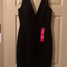 Black Low Cut Calvin Klein Dress With Sexy V Straps In Front. Measurements While Laying Flat. 37 Length 13 1/2 Waist 18 Bust Calvin Klein Gown, Bling Dress, Sheer Midi Dress, Wrap Shirt Dress, Sleeveless Wrap Dress, Cowl Neck Sweater Dress, Scuba Dress, Turtleneck Sweater Dress, Women Halter